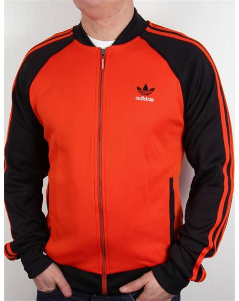 black and orange adidas jacket